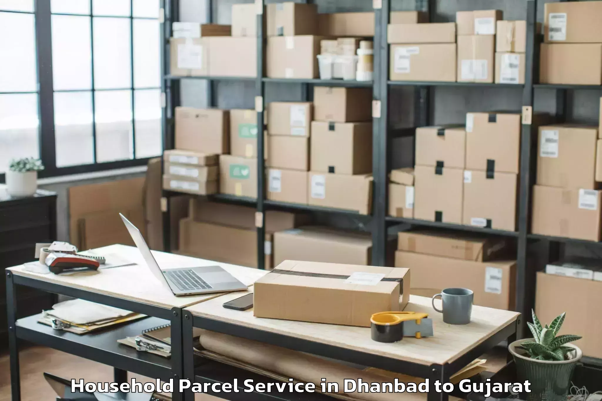 Affordable Dhanbad to Gujarat Ayurved University Jam Household Parcel